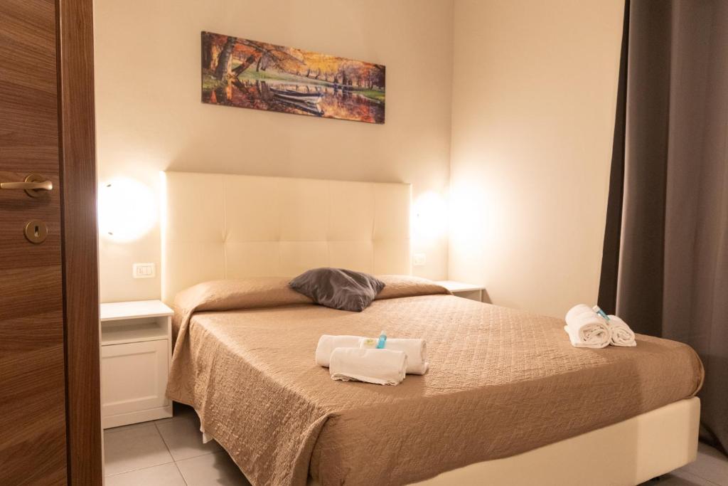 Posteľ alebo postele v izbe v ubytovaní Golden Milano Hotel