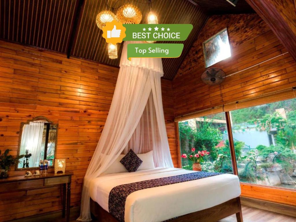 Säng eller sängar i ett rum på Tam Coc Lion Kings Hotel & Resort