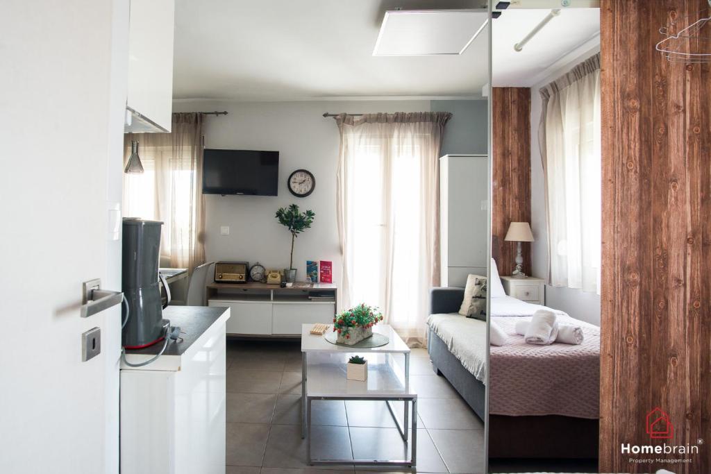 TV a/nebo společenská místnost v ubytování Pomegranade Luxury Apartment