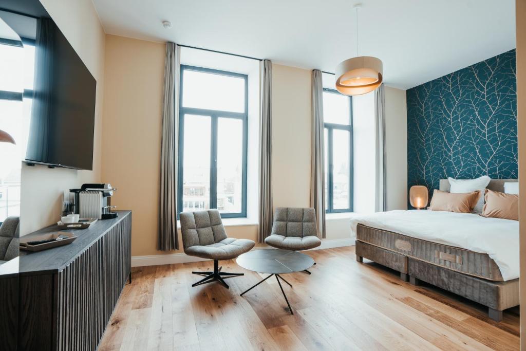 Postel nebo postele na pokoji v ubytování Hotel Casino Elite