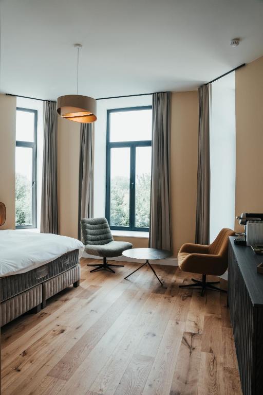 Postel nebo postele na pokoji v ubytování Hotel Casino Elite