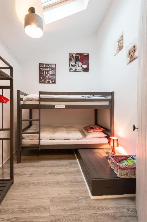 Postel nebo postele na pokoji v ubytování Ferme Elhorga