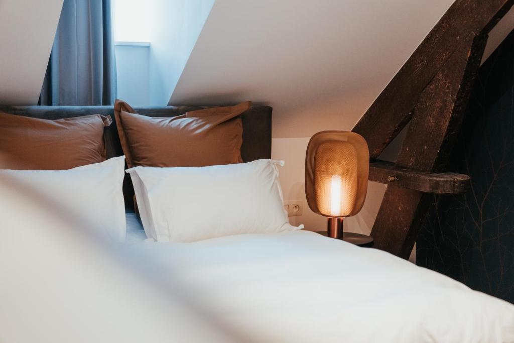 Postel nebo postele na pokoji v ubytování Hotel Casino Elite