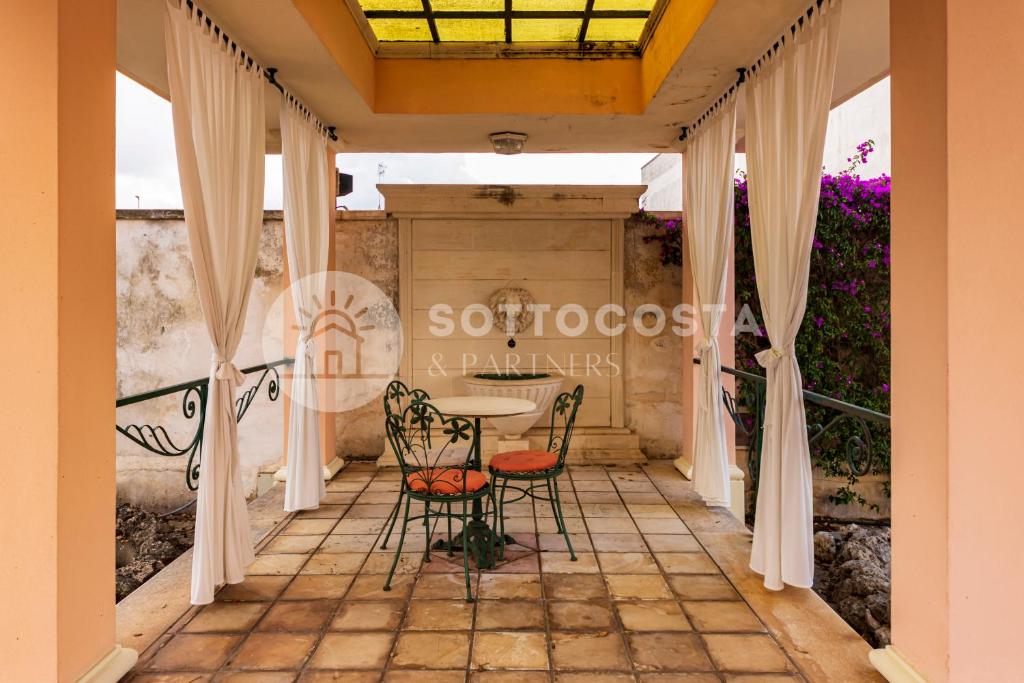 Patio nebo venkovní prostory v ubytování Villa Aida