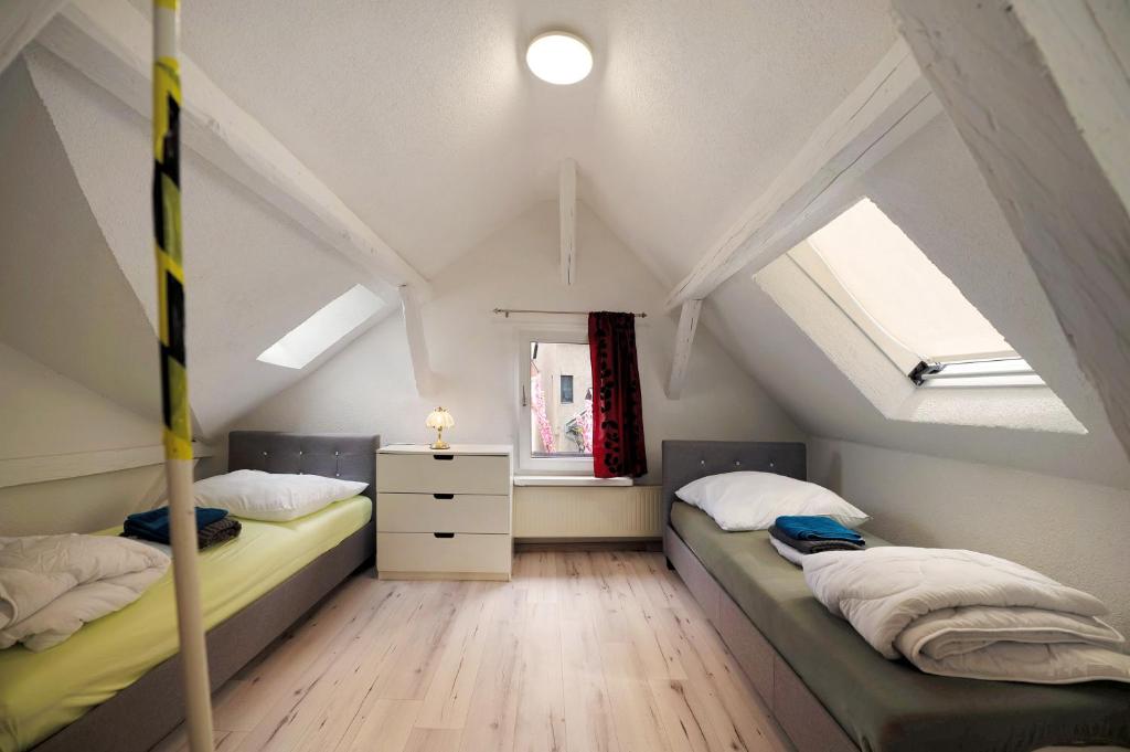 Postel nebo postele na pokoji v ubytování Ferienhaus bei Reichsburg Cochem