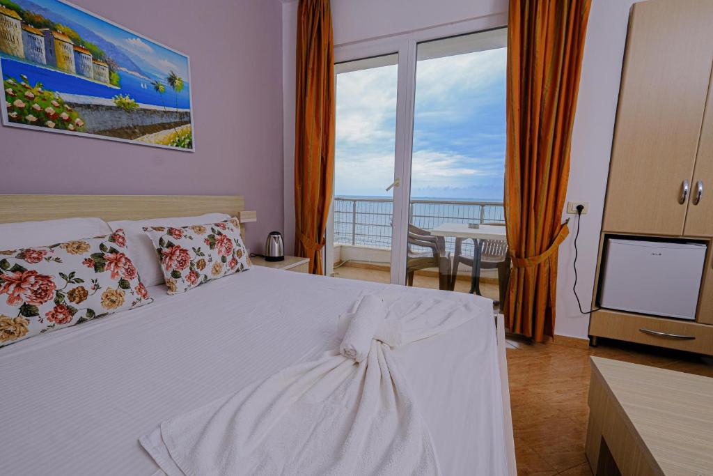 Postel nebo postele na pokoji v ubytování Sun Shine Hotel
