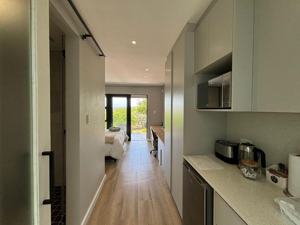 Kuchyň nebo kuchyňský kout v ubytování Swanemeer Apartments