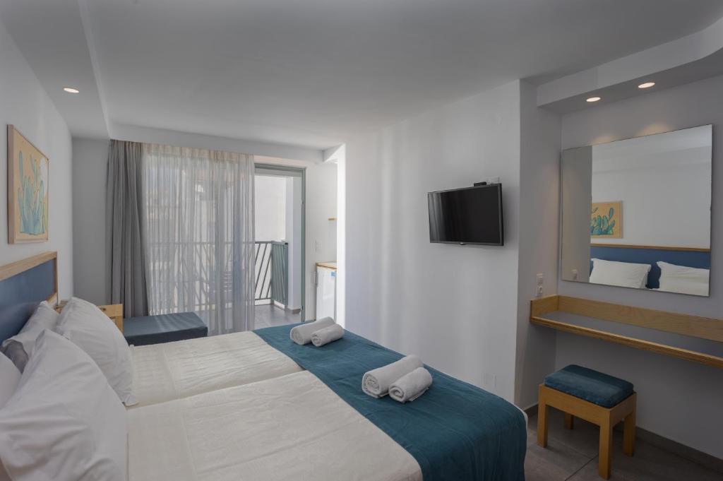 Posteľ alebo postele v izbe v ubytovaní Alia Beach Hotel by Estia