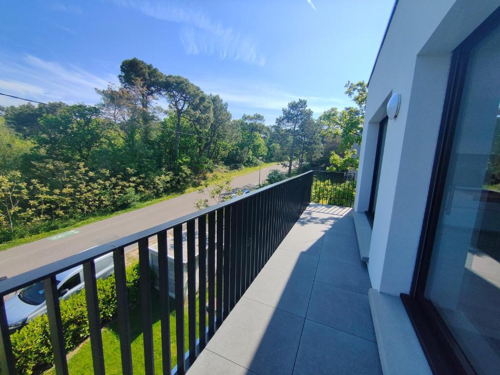 Balkón nebo terasa v ubytování Superbe appartement avec vue sur la foret du Touquet Résidence les Dunes