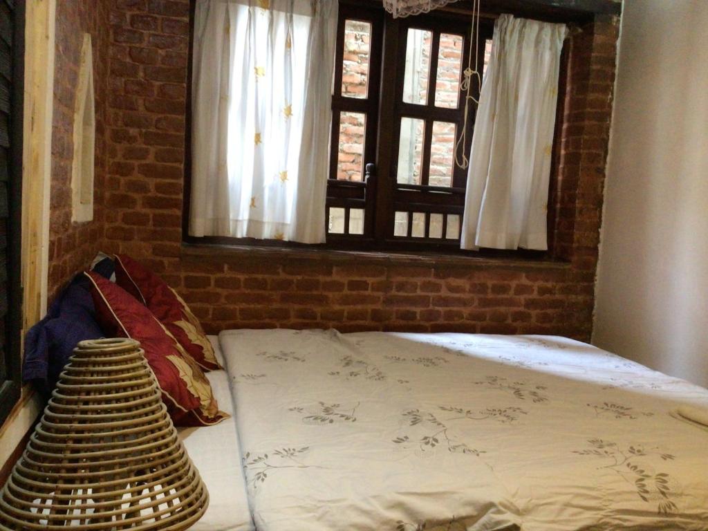 Postel nebo postele na pokoji v ubytování Yamba Traditional Home