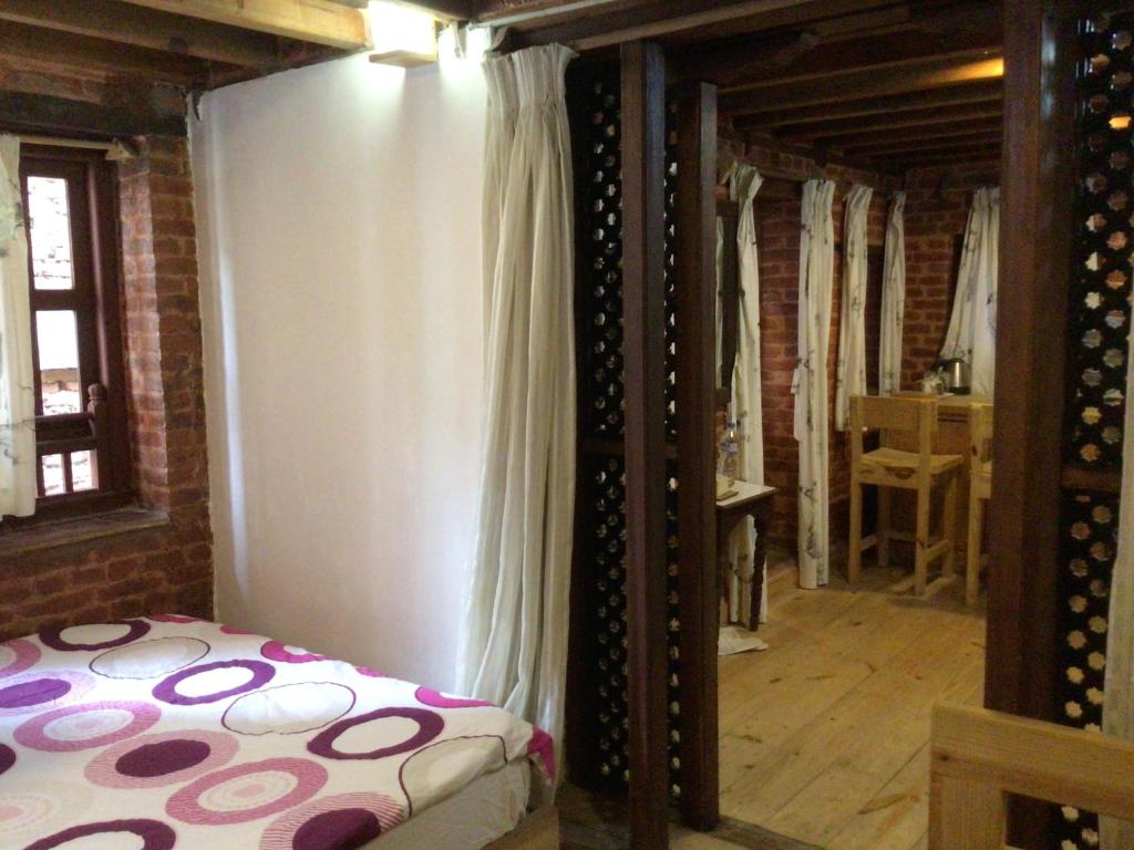 Postel nebo postele na pokoji v ubytování Yamba Traditional Home