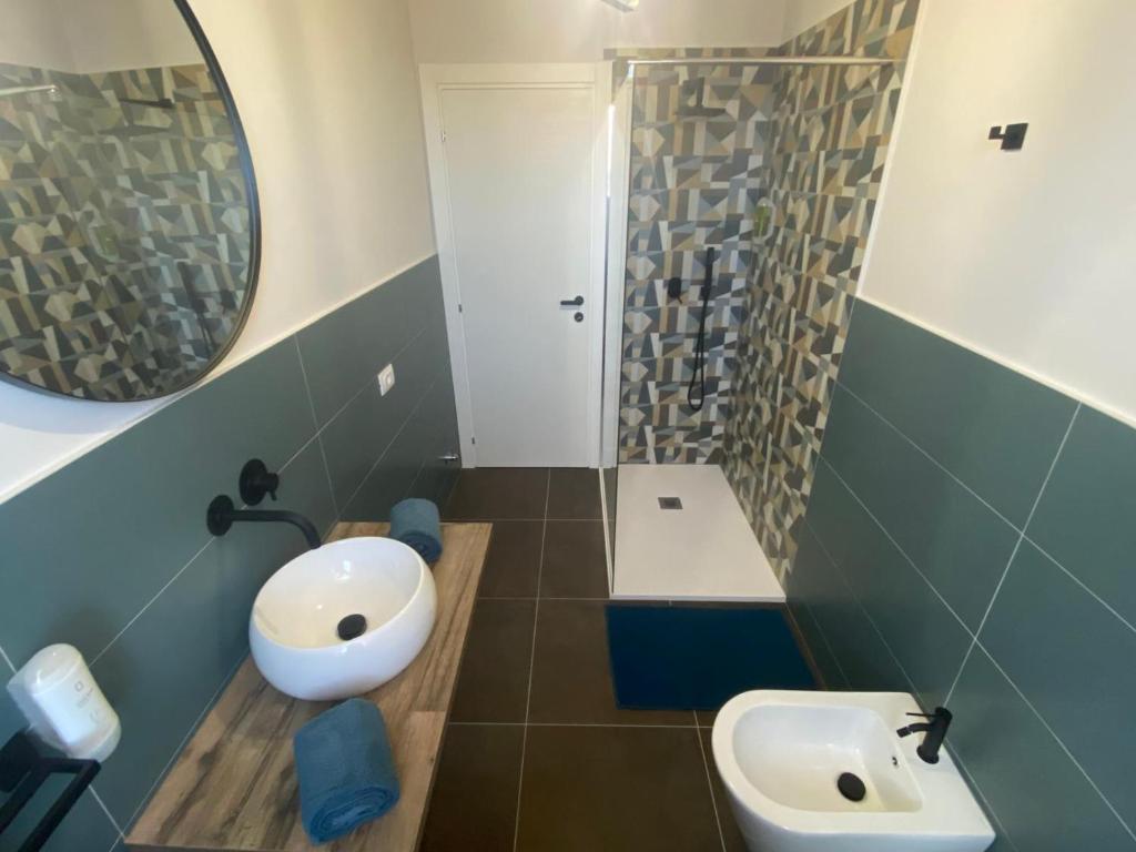 Koupelna v ubytování Inn Alba
