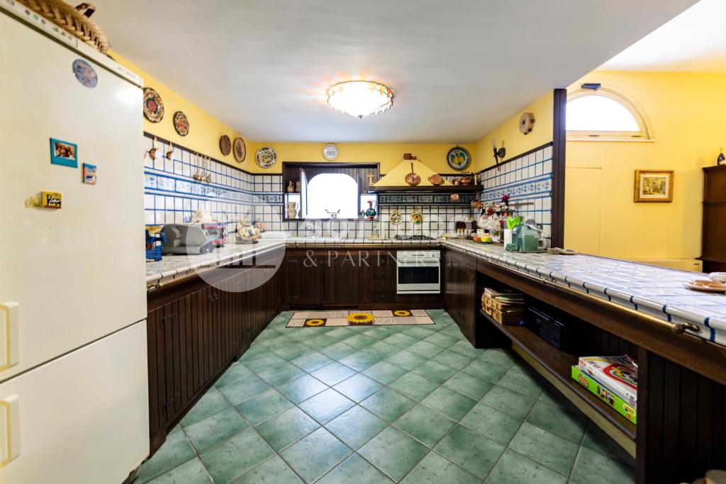 Kuchyň nebo kuchyňský kout v ubytování Villa Aida