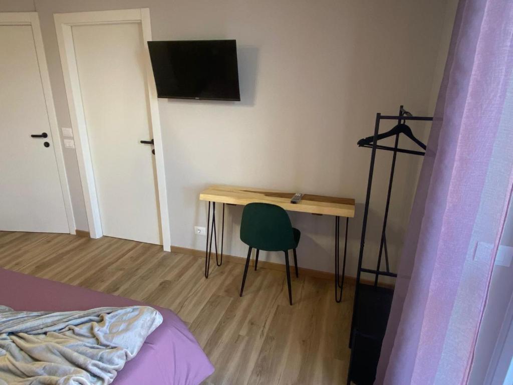 TV a/nebo společenská místnost v ubytování Inn Alba