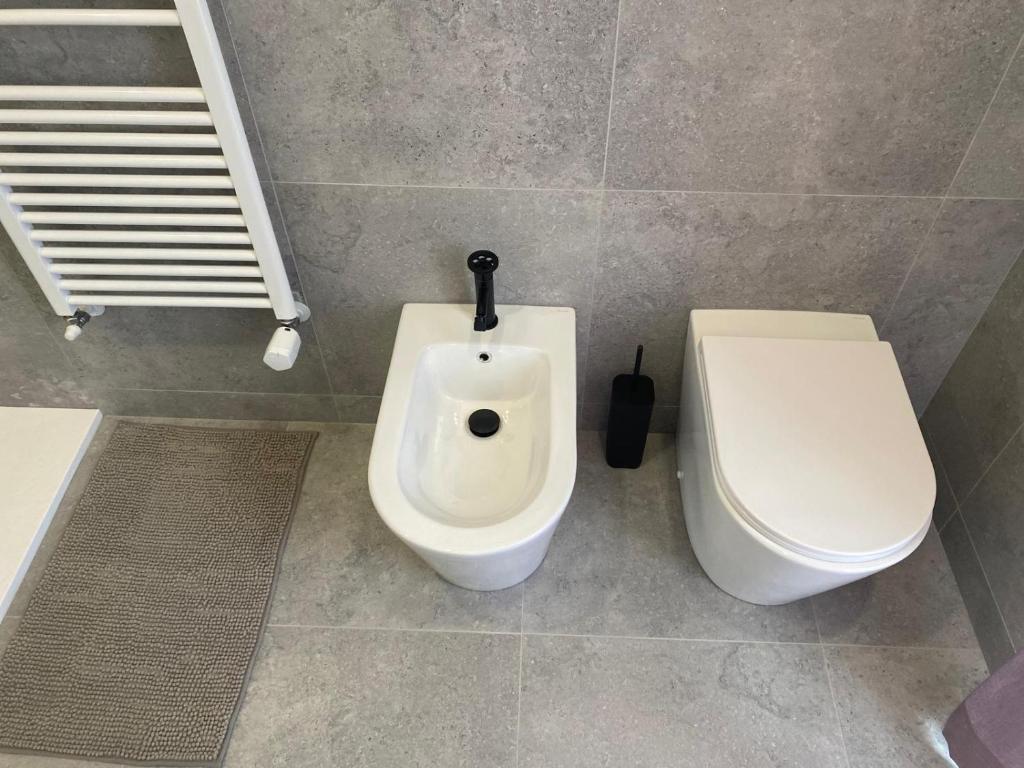 Koupelna v ubytování Inn Alba