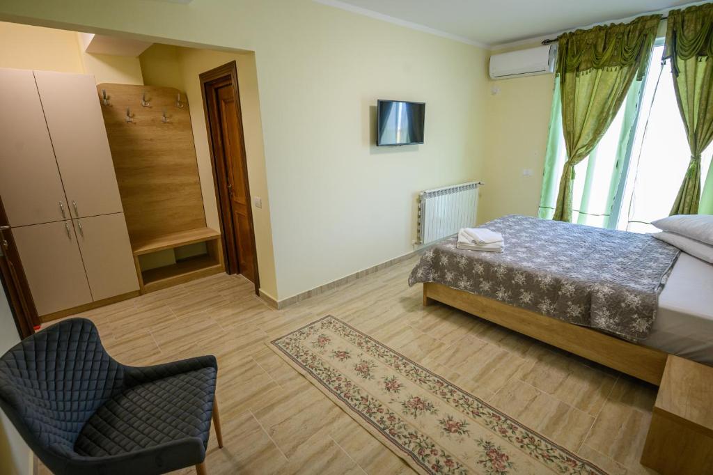 Postel nebo postele na pokoji v ubytování Hotel Austin Ov
