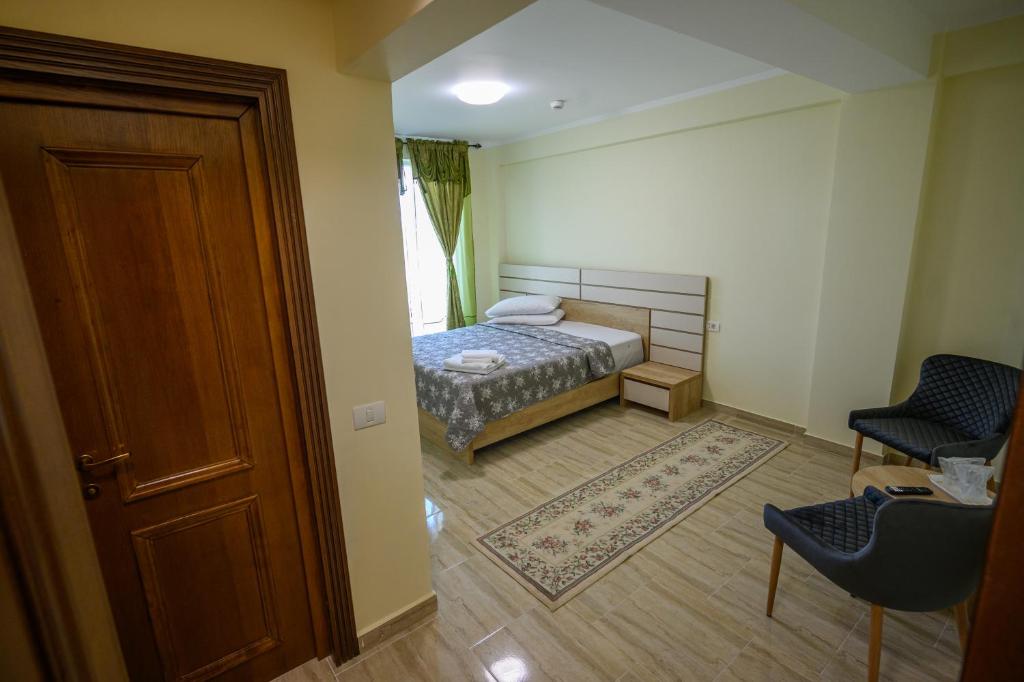 Postel nebo postele na pokoji v ubytování Hotel Austin Ov