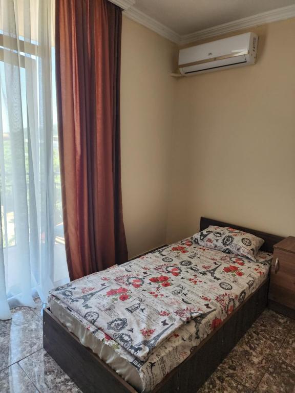 Postel nebo postele na pokoji v ubytování Vizitori Hotel