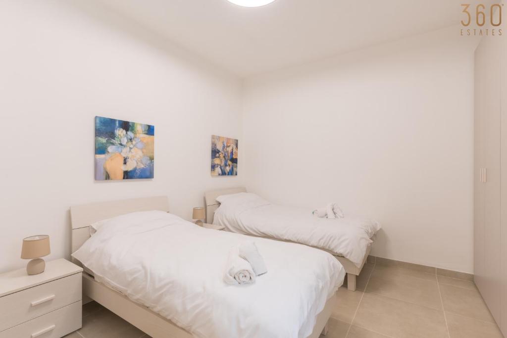 Postel nebo postele na pokoji v ubytování Stunning 3BR home in Gozo with access to pool by 360 Estates