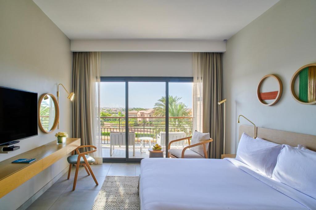 Postel nebo postele na pokoji v ubytování Marassi Boutique Hotel-Marina 1