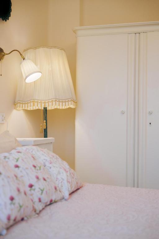Postel nebo postele na pokoji v ubytování Eperkert Vendégház