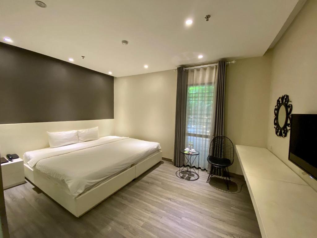 TV a/nebo společenská místnost v ubytování Hanoi Ping Luxury Hotel