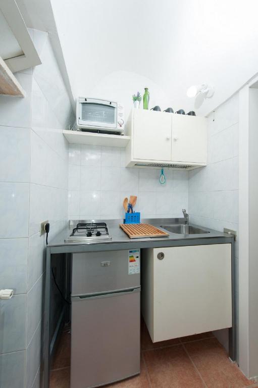 Kuchyňa alebo kuchynka v ubytovaní Casa La Ronza