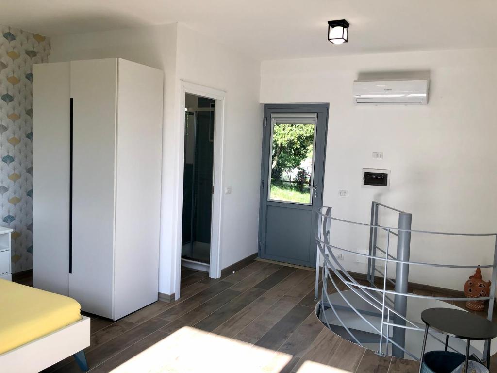Postel nebo postele na pokoji v ubytování Colonna House