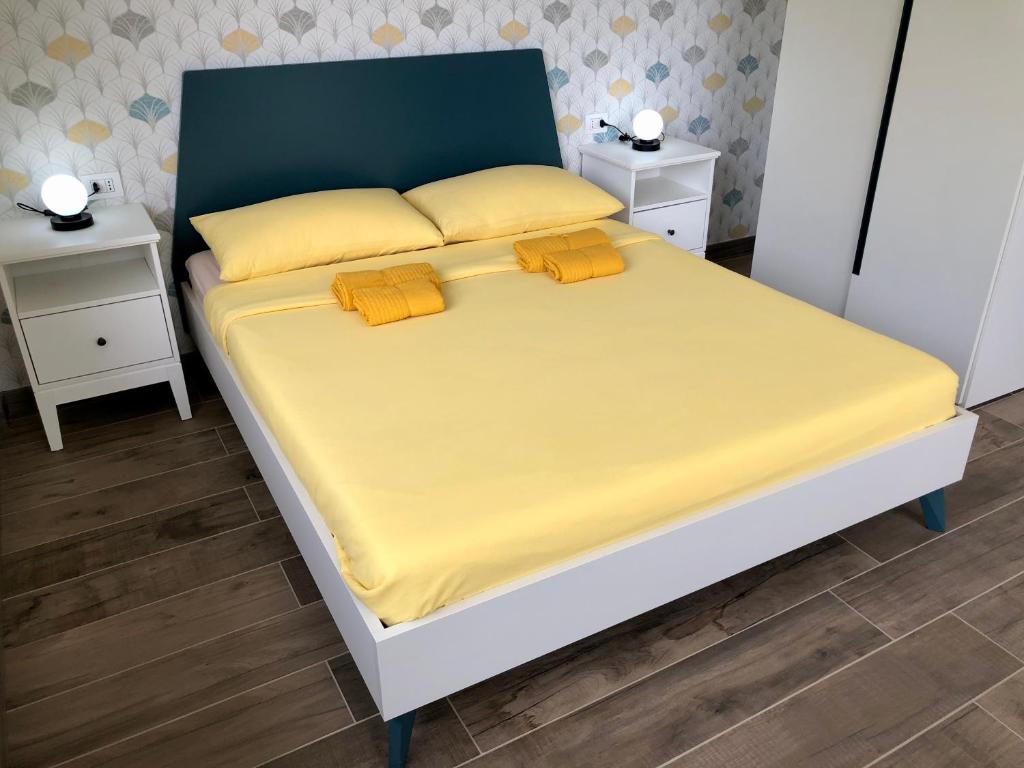 Postel nebo postele na pokoji v ubytování Colonna House