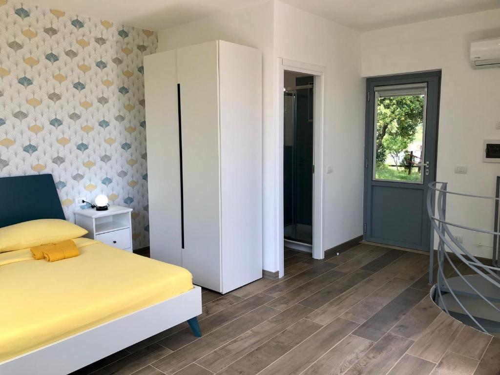 Postel nebo postele na pokoji v ubytování Colonna House