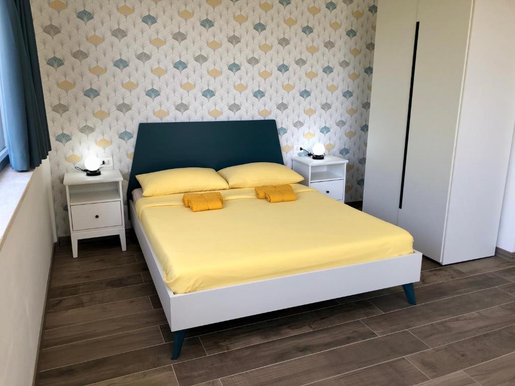 Postel nebo postele na pokoji v ubytování Colonna House