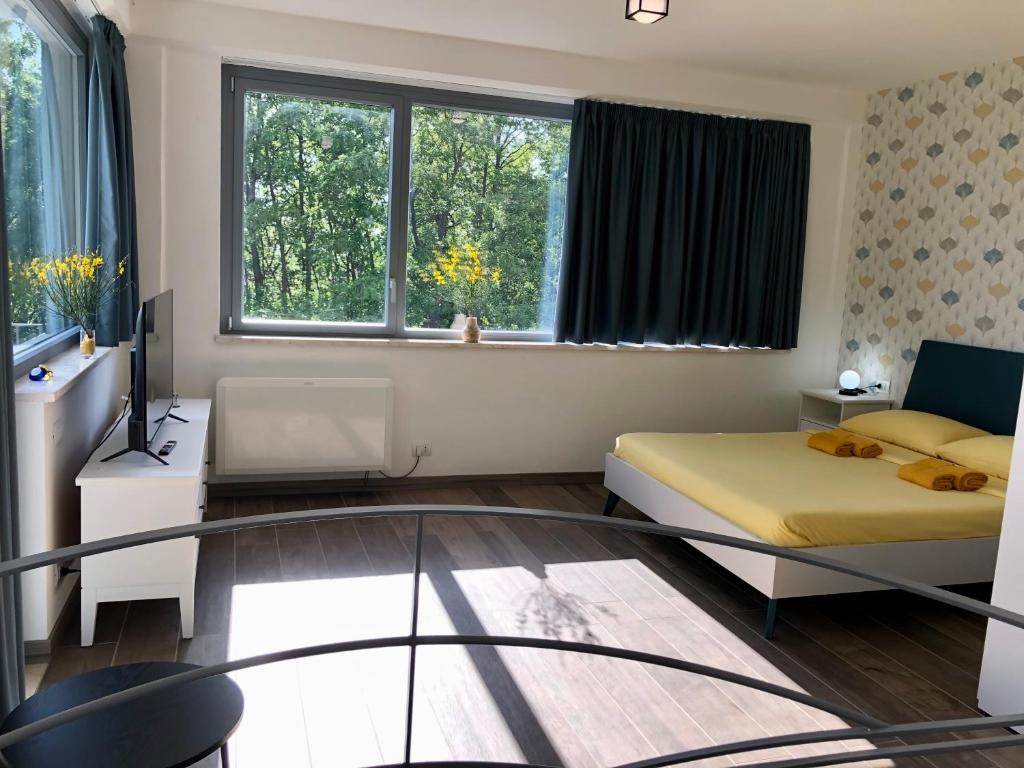 Postel nebo postele na pokoji v ubytování Colonna House