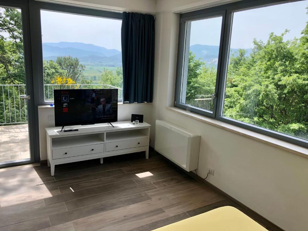 TV a/nebo společenská místnost v ubytování Colonna House