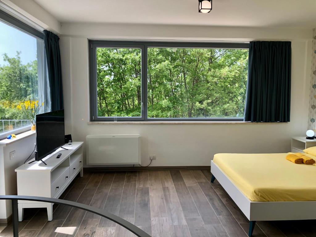 Postel nebo postele na pokoji v ubytování Colonna House