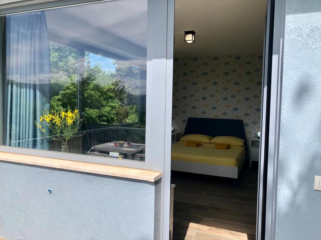 Postel nebo postele na pokoji v ubytování Colonna House