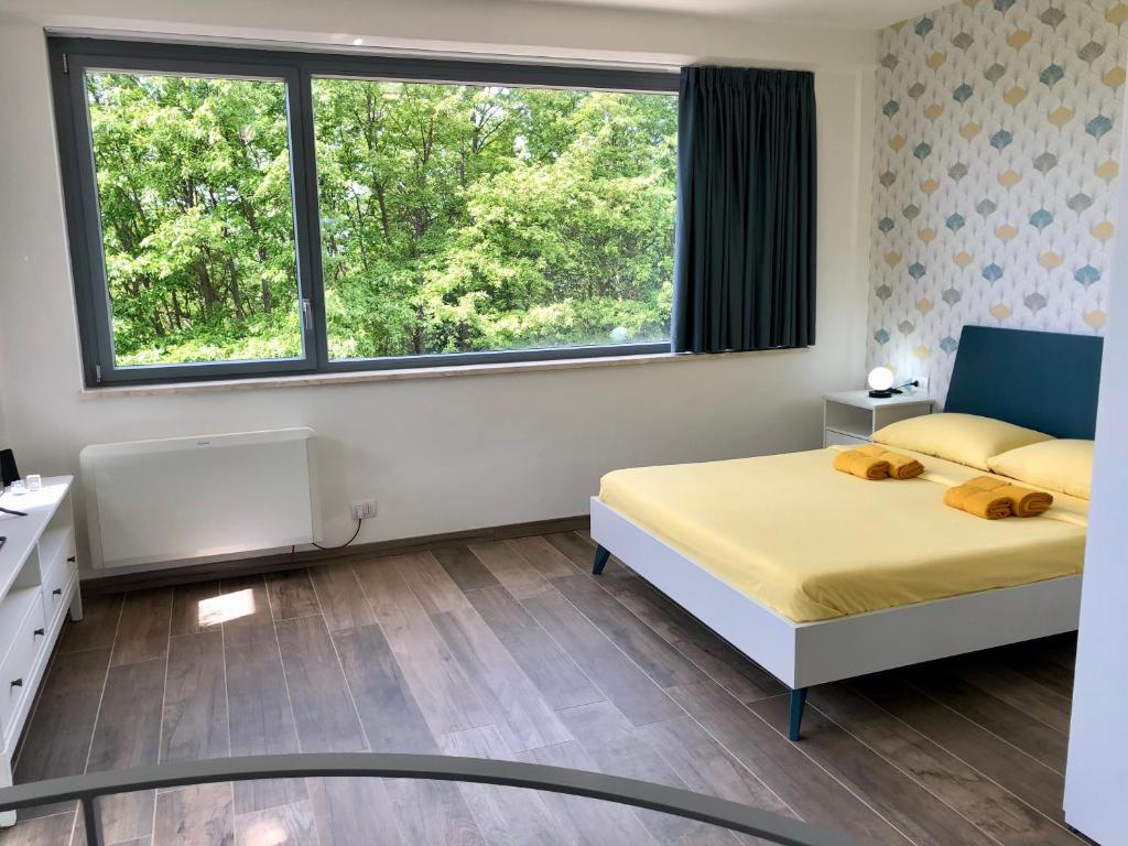Postel nebo postele na pokoji v ubytování Colonna House