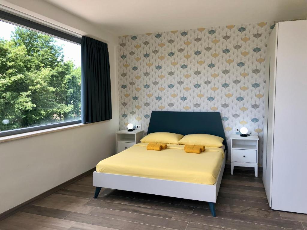 Postel nebo postele na pokoji v ubytování Colonna House