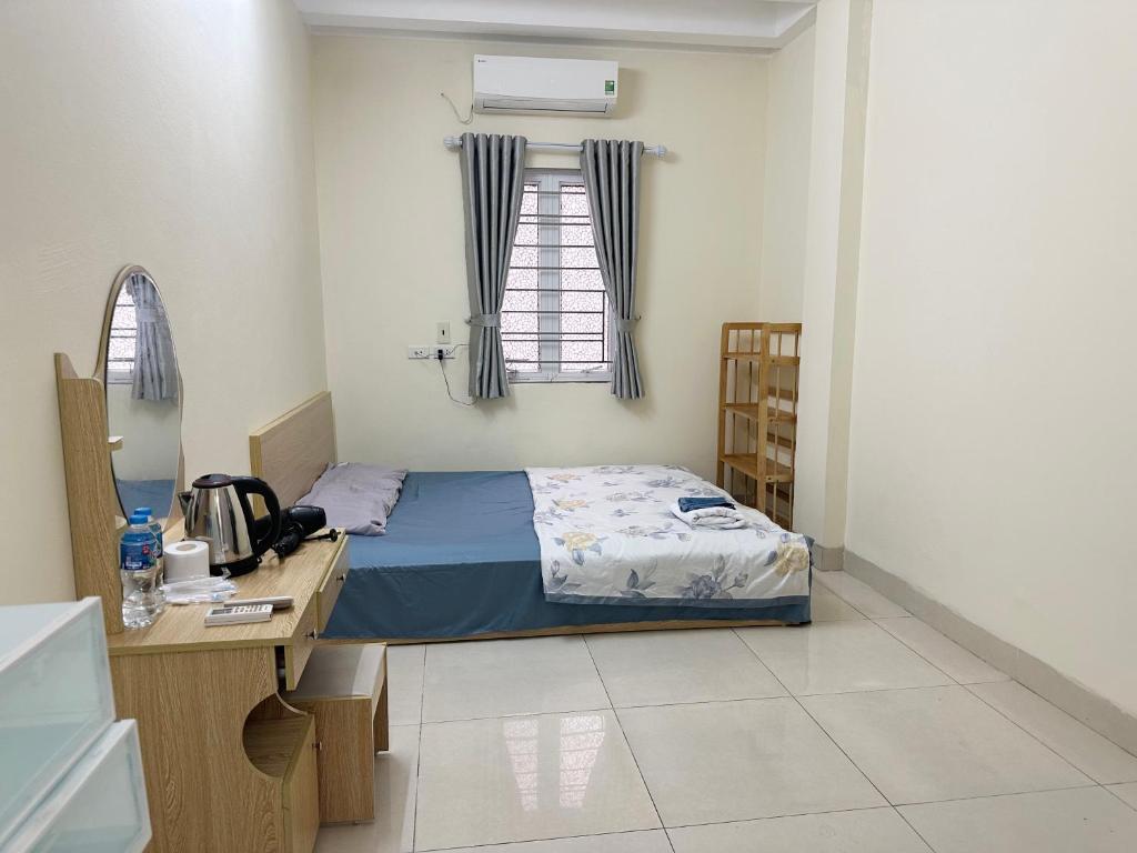 Postel nebo postele na pokoji v ubytování nhatro21