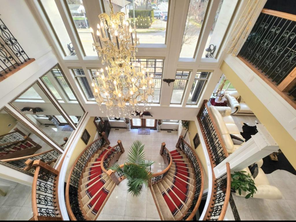 an overhead view of a lobby with a chandelier at The Empress Palace Hotel in Surrey