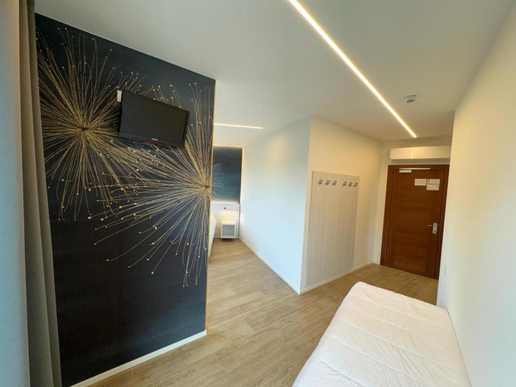 Postel nebo postele na pokoji v ubytování Hotel Franz