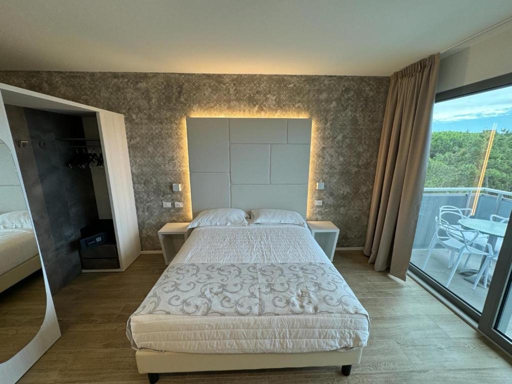 Postel nebo postele na pokoji v ubytování Hotel Franz