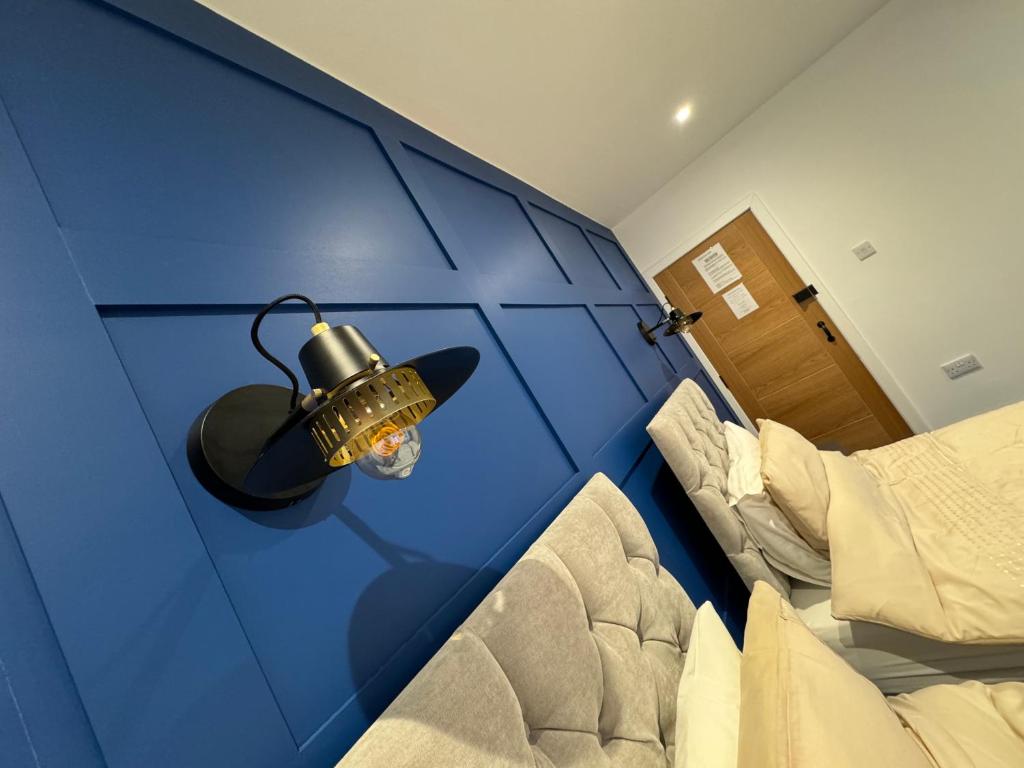 Postel nebo postele na pokoji v ubytování Ashfield Guesthouse