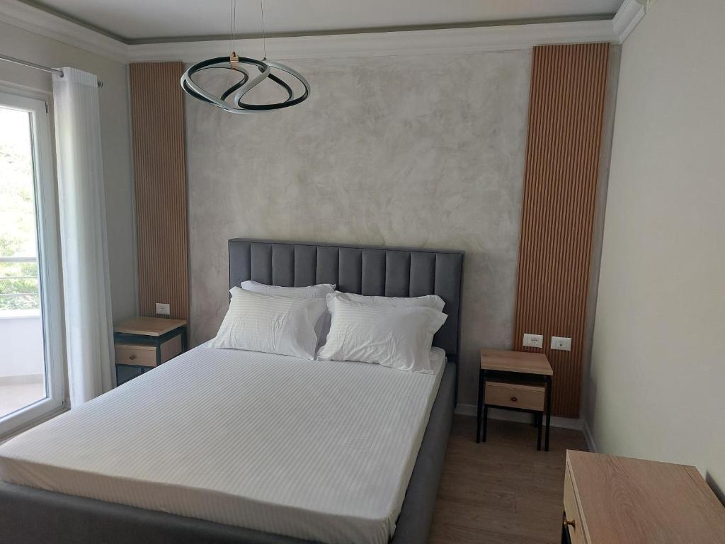 Postel nebo postele na pokoji v ubytování Hotel DEMOLI
