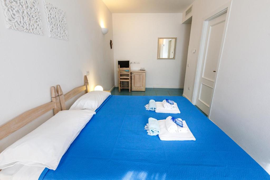 Postel nebo postele na pokoji v ubytování Villa Tre Mari