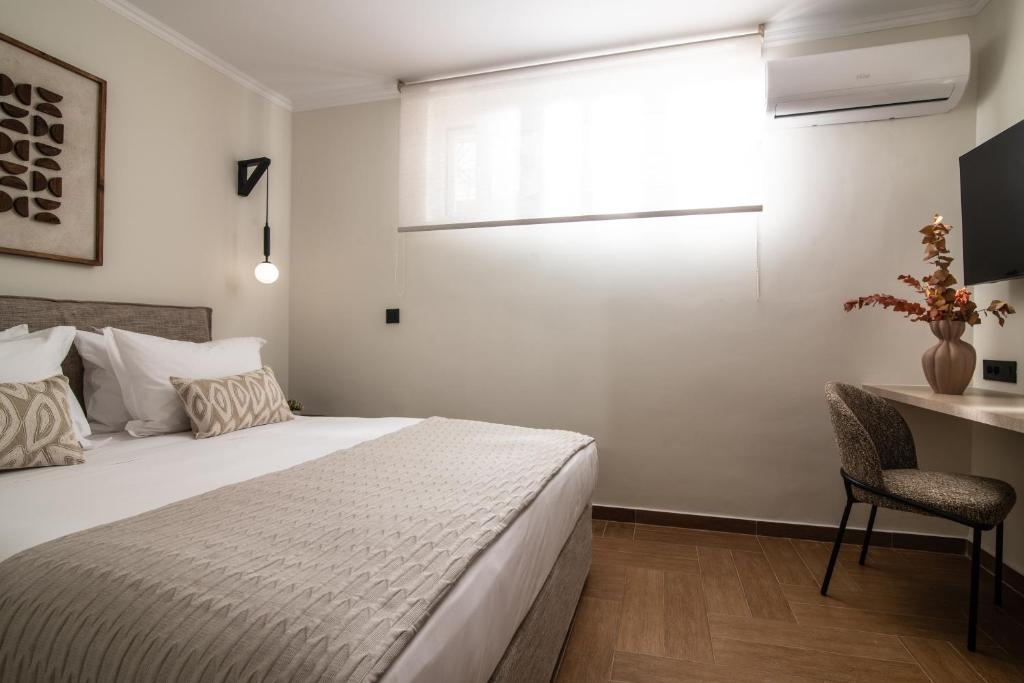 Postel nebo postele na pokoji v ubytování Villa Alexandros