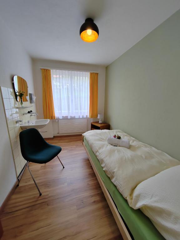 Postel nebo postele na pokoji v ubytování Hotel du Cerf