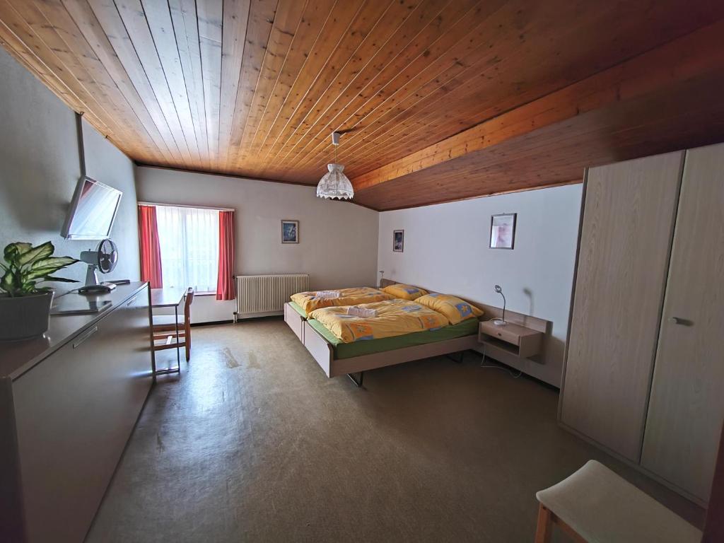 Postel nebo postele na pokoji v ubytování Hotel du Cerf