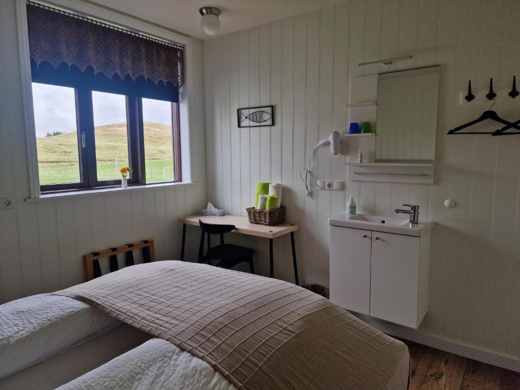 Cucina o angolo cottura di Sólheimahjáleiga Guesthouse