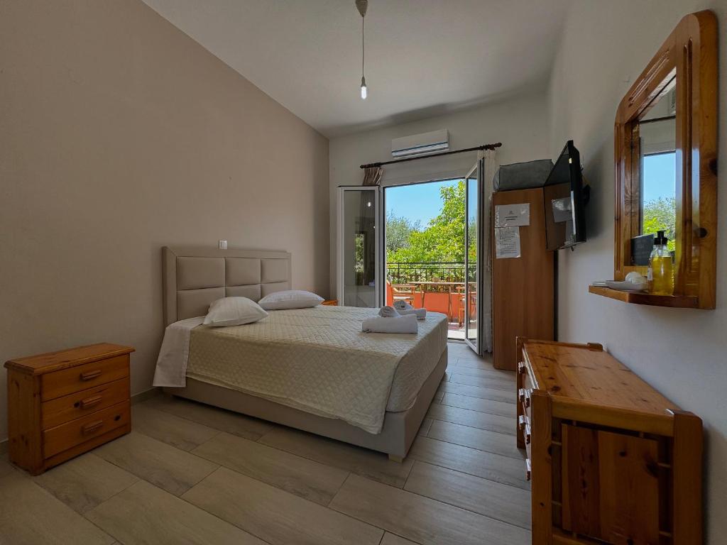Postel nebo postele na pokoji v ubytování Athina Studios