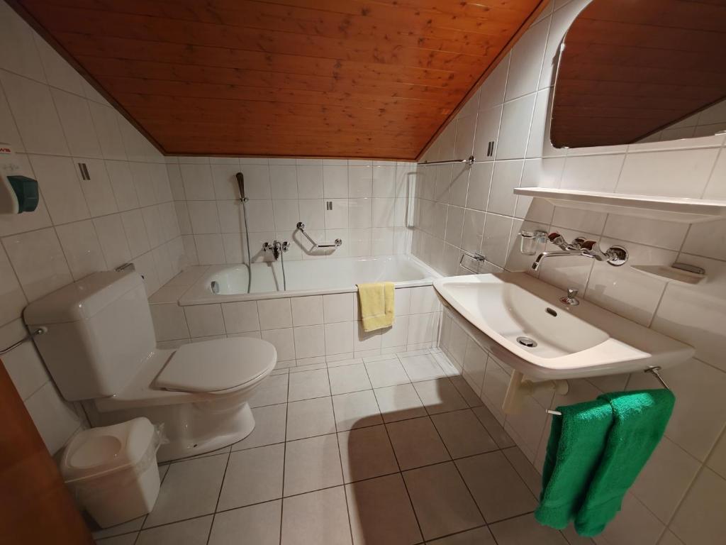 Koupelna v ubytování Hotel du Cerf